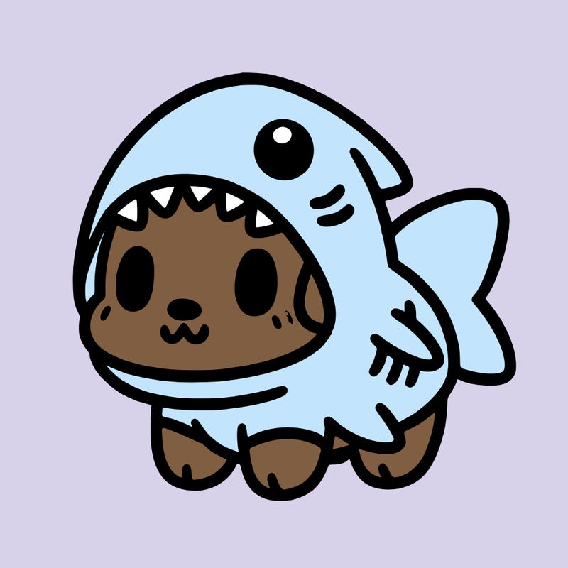 cute dog wearing a shark costume