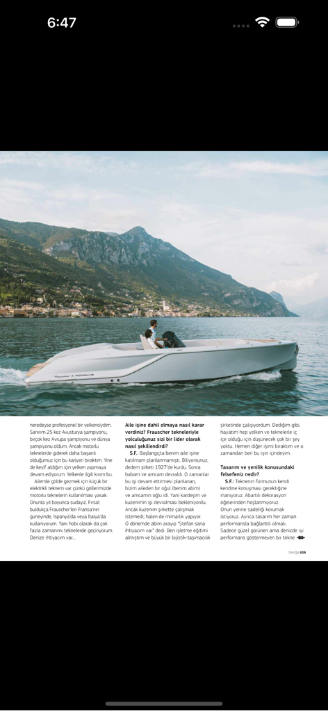 Naviga Magazine - Naviga Magazine page showing a white motorboat on a scenic lake with mountains