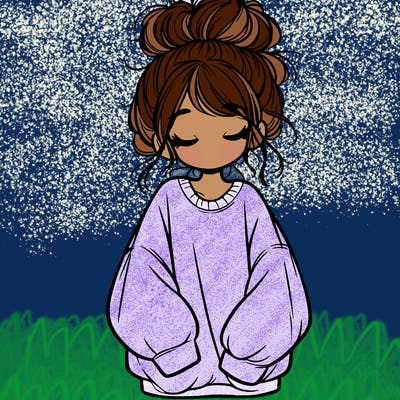 girl with baggy sweatshirt and messy bun