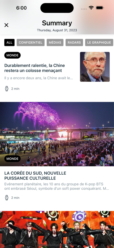 Un flux de résumé dans l'application du magazine Challenges affichant des articles sur l'économie mondiale et les tendances culturelles