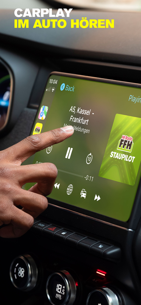 A hand using the Hit Radio FFH app on a car's CarPlay display showing traffic information for the A5 highway.