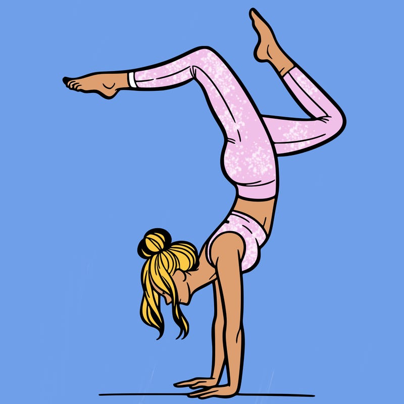 a woman doing a handstand