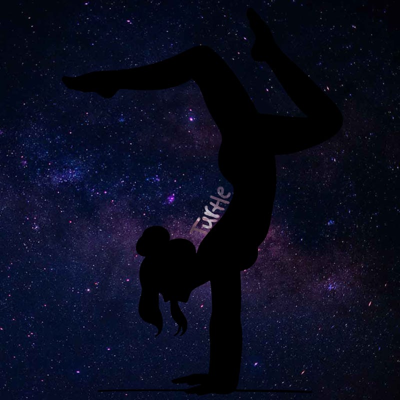 a woman doing a handstand