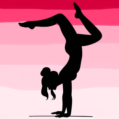 a woman doing a handstand