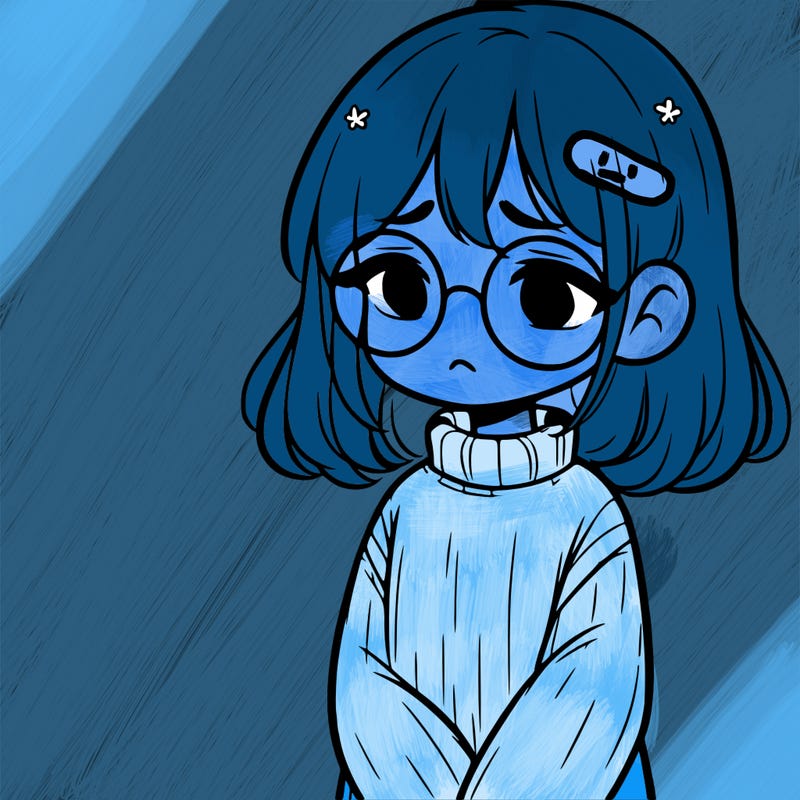 sad girl with glasses in a sweater