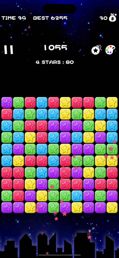 Popping Stars-classic game - Gameplay screen of Popping Stars featuring a grid of colorful star blocks against a night sky background