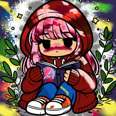 girl in oversized hoodie reading a book