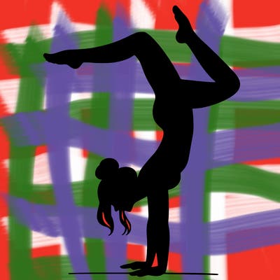 a woman doing a handstand
