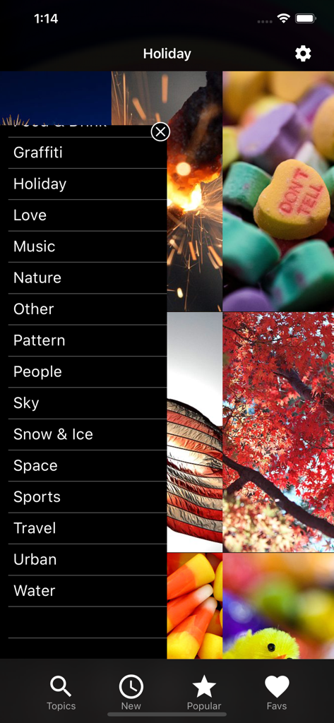 Wallpapers HD for iPhone! - Una lista de categorías de fondos de pantalla, incluyendo naturaleza, festividades y espacio, en la interfaz de la app Wallpapers HD.