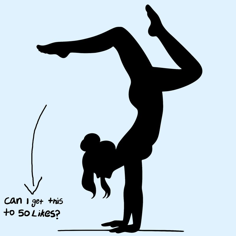 a woman doing a handstand