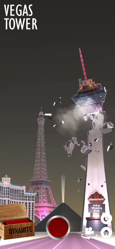 Gameplay screenshot showing the demolition of the Vegas Tower with dynamite in Fake Island Demolish.