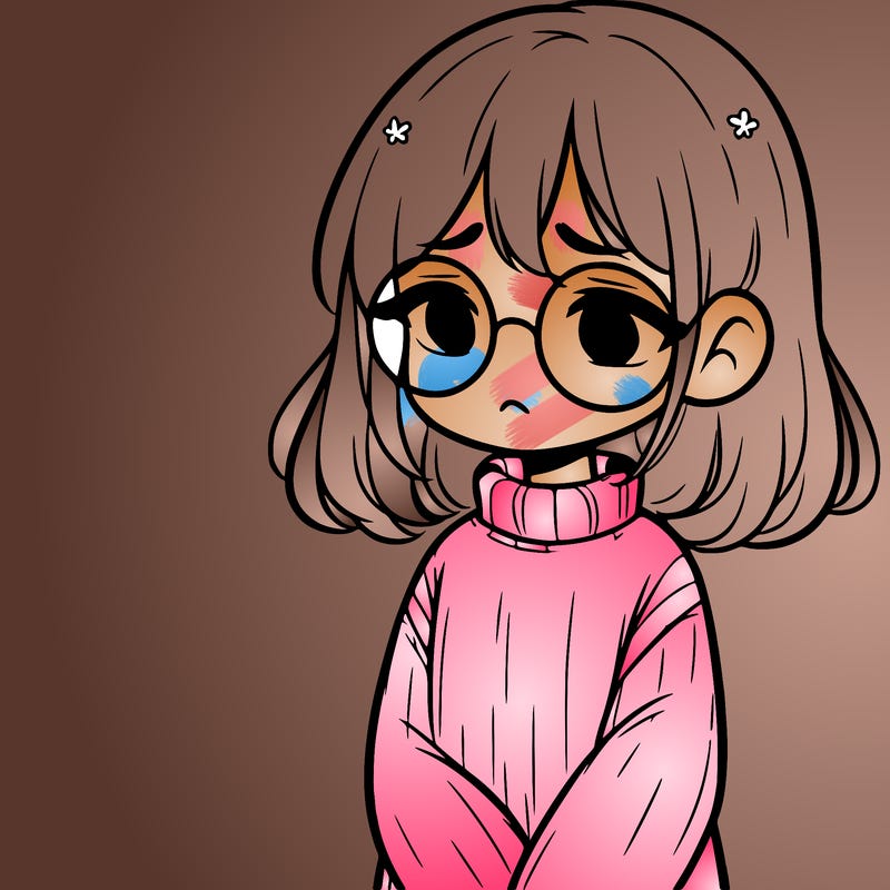 sad girl with glasses in a sweater