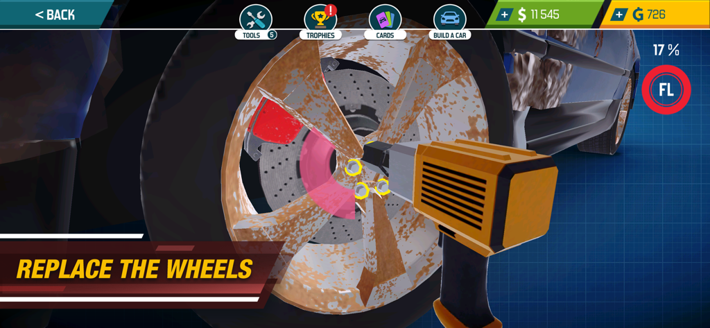 A close up view of a player using an impact wrench to replace a rusty wheel in Car Mechanic Simulator 21