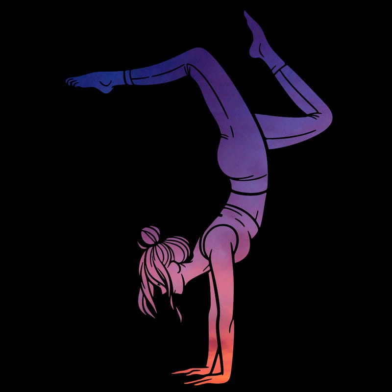 a woman doing a handstand