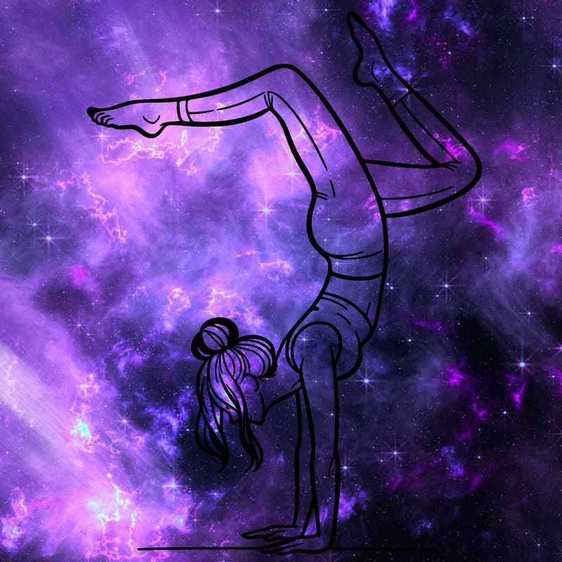 a woman doing a handstand