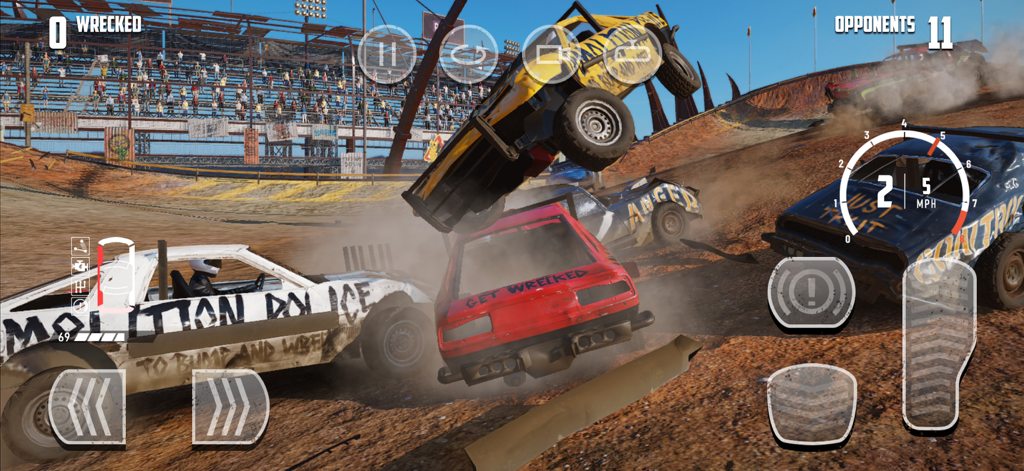 A high impact car crash in a demolition derby arena with one vehicle flipped in mid air