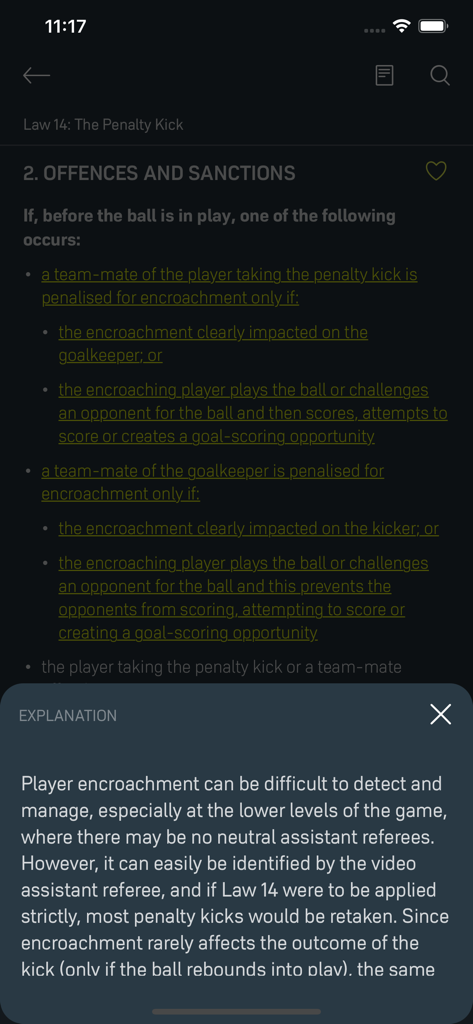 Laws of the Game - Screenshot of the IFAB Laws of the Game app showing a detailed explanation for player encroachment during a penalty kick