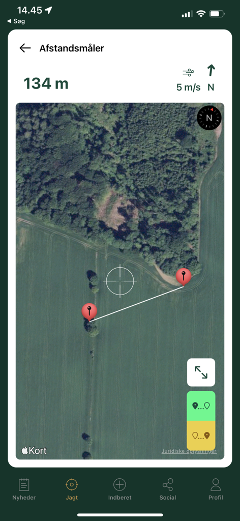 Vista de mapa satelital en la aplicación Jäger mostrando una medición de distancia de 134 metros y la velocidad del viento para cazadores.