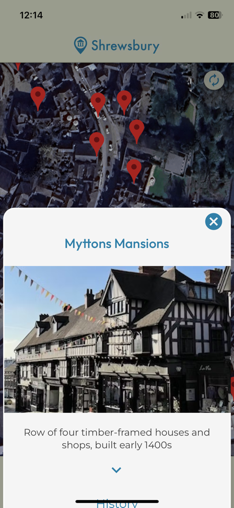 HistoMap Shrewsbury - ヒストマップ・シュルーズベリーのアプリ画面。衛星地図に位置ピンが表示され、中世のミットン邸の詳細ポップアップが表示されています。
