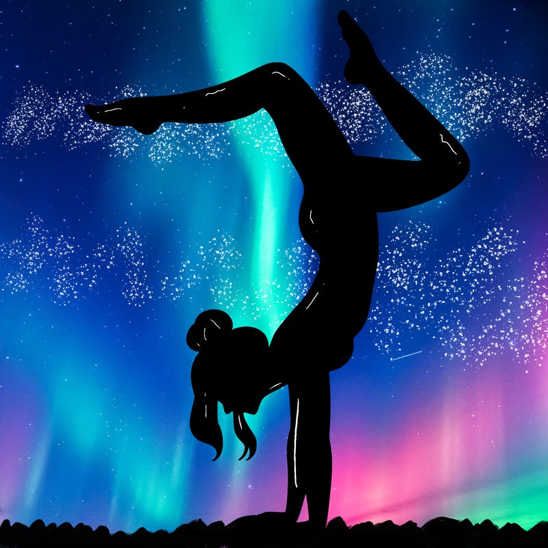 a woman doing a handstand