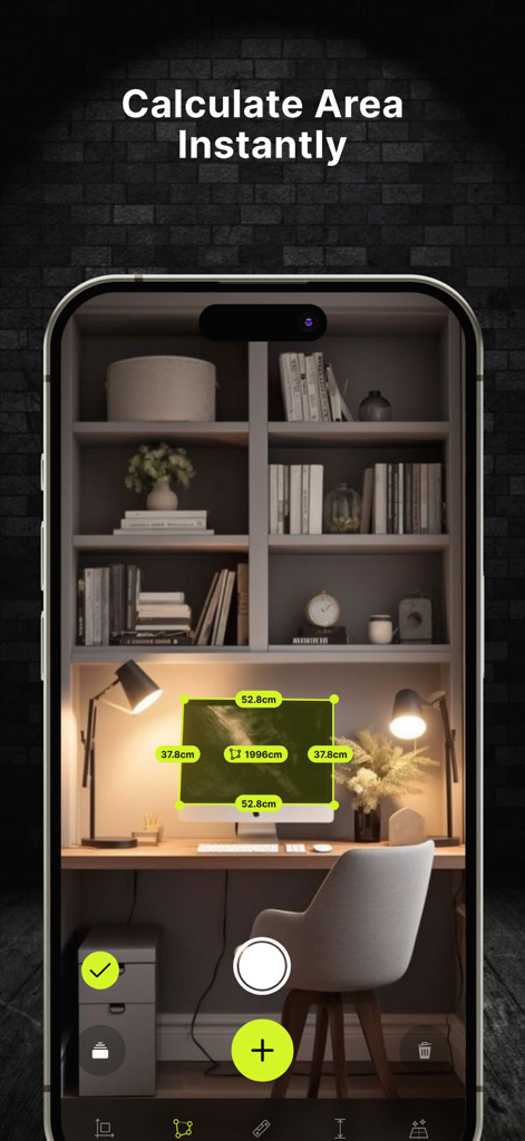Digital ruler app calculating the surface area of a computer screen on a desk using AR technology