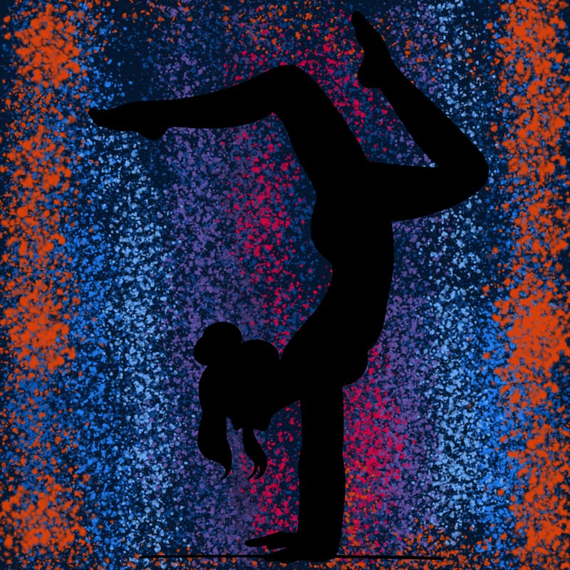 a woman doing a handstand