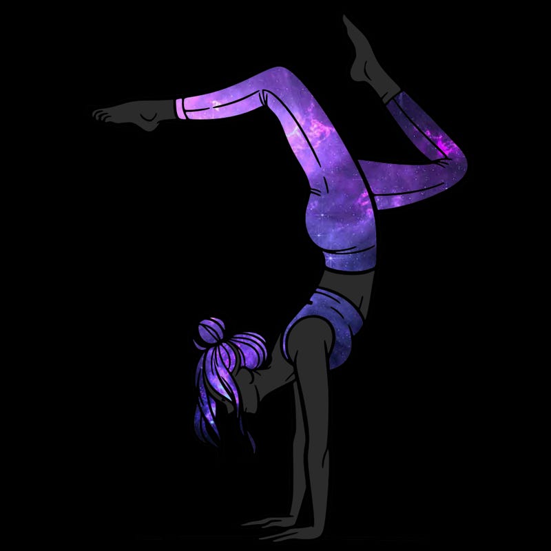a woman doing a handstand
