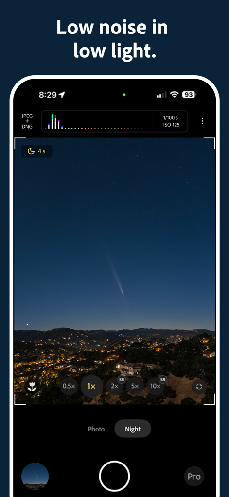 Project Indigo camera app in Night Mode capturing a starry sky with a comet over a city landscape.
