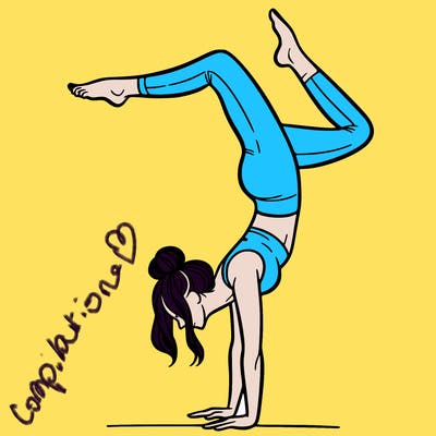 a woman doing a handstand