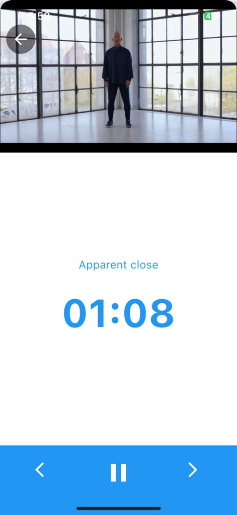 Tai Chi app interface showing a video workout session with a man practicing and a digital countdown timer
