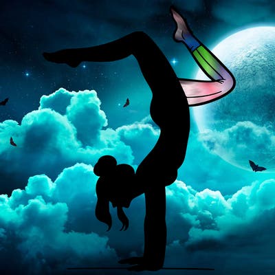 a woman doing a handstand