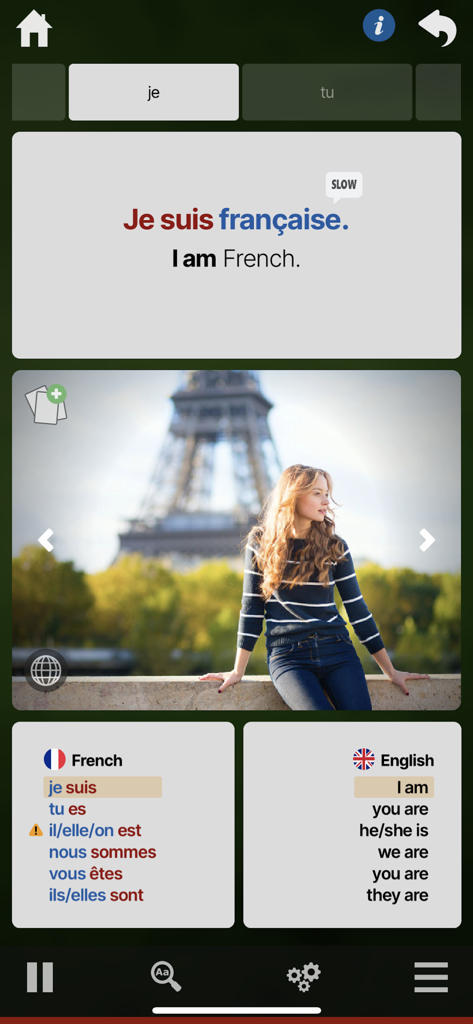 OUINO French (members only) - A French language lesson in the OUINO app showing the conjugation of the verb to be with an image of the Eiffel Tower.