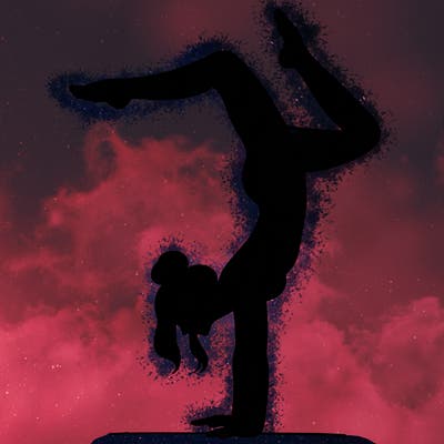 a woman doing a handstand