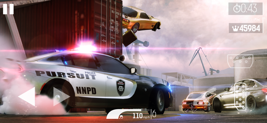 Nitro Nation: Drag Racing - A police pursuit vehicle drifting in a shipping port during a high speed race in Nitro Nation