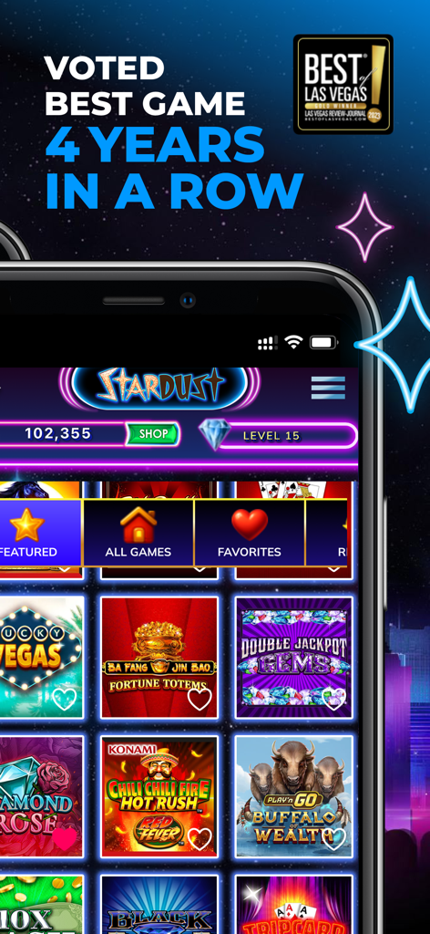 Mobile phone screen displaying the Stardust Social Casino game lobby with various slot machine tiles and a Best of Las Vegas award badge