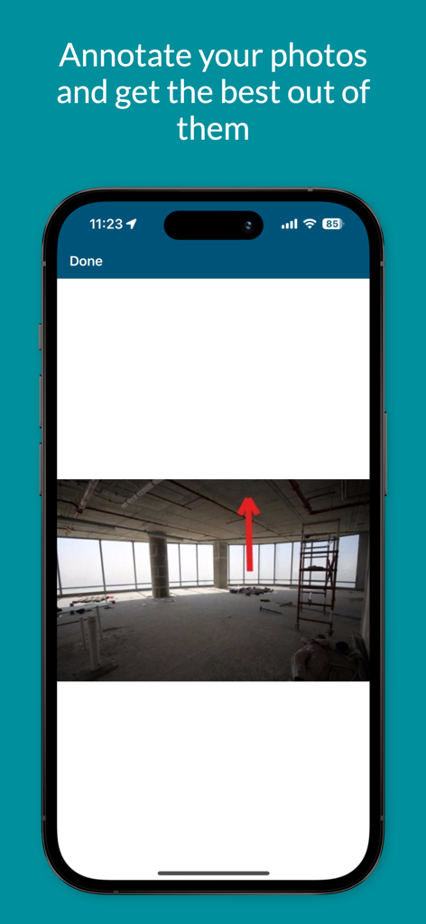 Bulldozair mobile app interface showing a construction site photo with a red arrow annotation for reporting