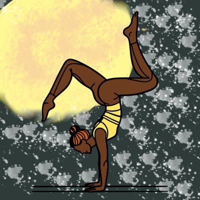 a woman doing a handstand