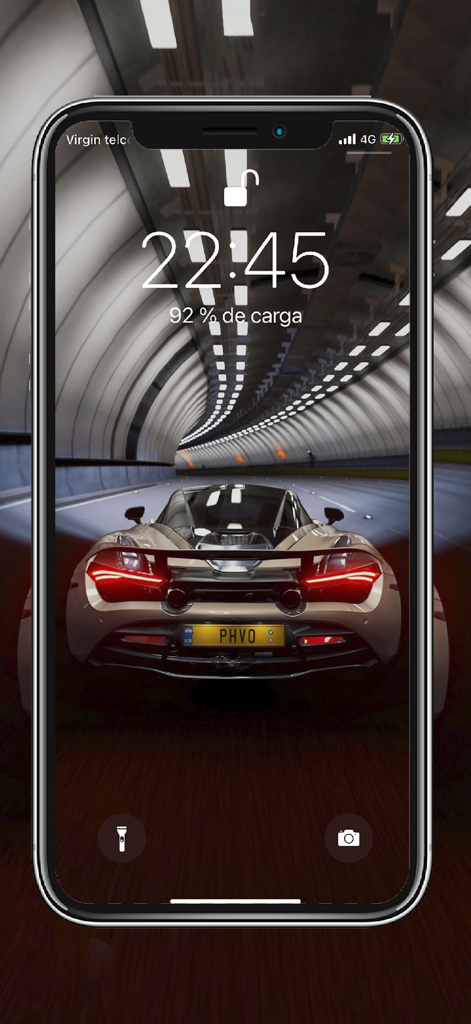 Car HD Wallpapers Collection - HD supercar wallpaper on an iPhone lock screen featuring a performance car in a tunnel