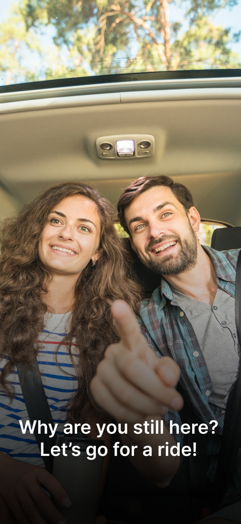 A cheerful couple enjoying a car ride using the Udrive car sharing app