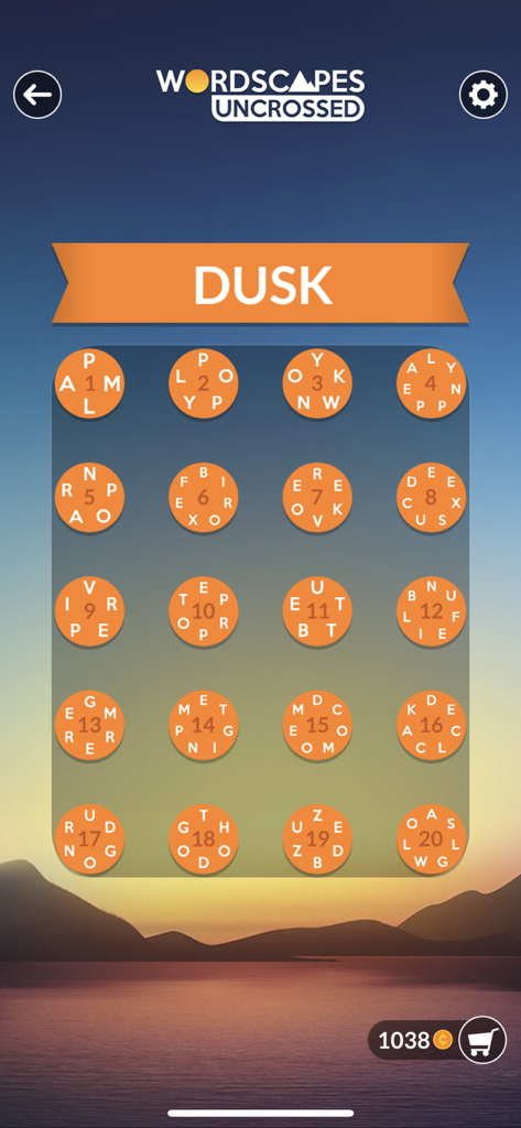 Écran de sélection de niveau pour Wordscapes Uncrossed avec un fond de paysage de coucher de soleil.