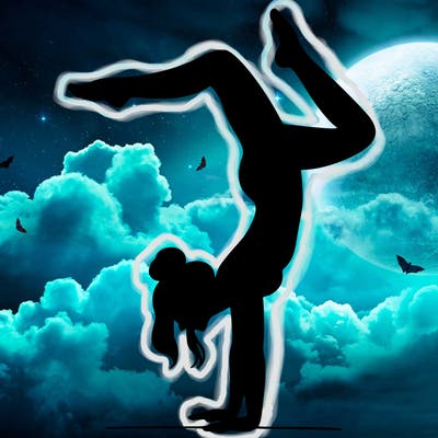 a woman doing a handstand