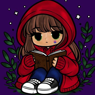 girl in oversized hoodie reading a book