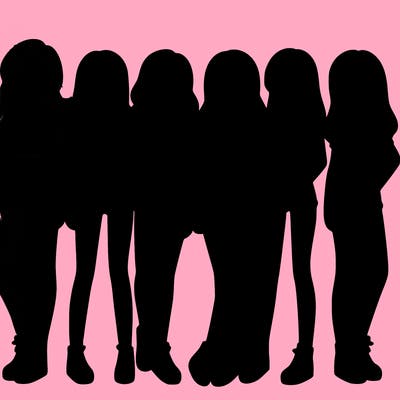 a group of girls wearing crop tops and shorts