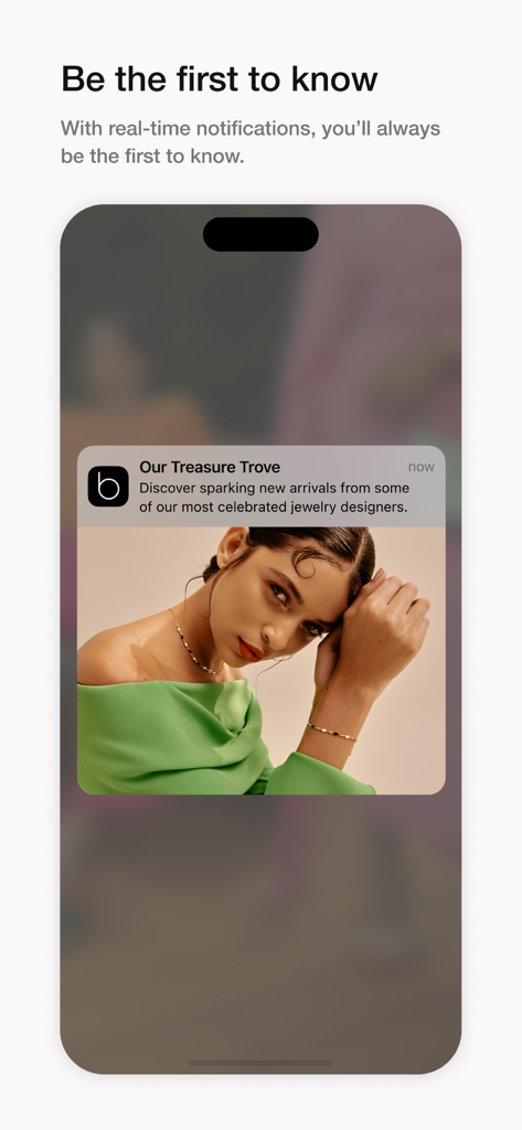 Bloomingdale’s Middle East - ブルーミングデール 中東アプリからの高級ジュエリープッシュ通知を示すスマートフォンのモックアップ。