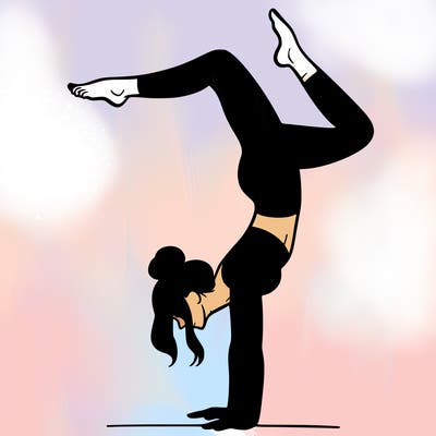 a woman doing a handstand