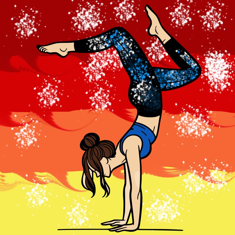 a woman doing a handstand