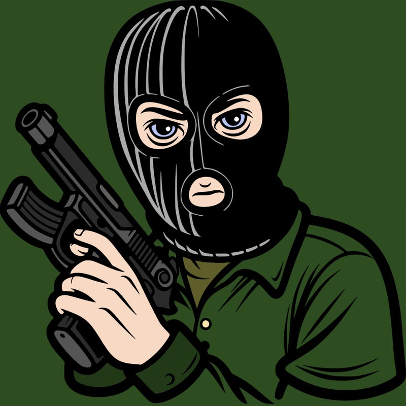 a masked man with a gun