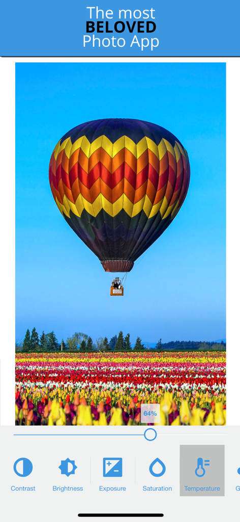 Interfaz de la aplicación Photo Studio que muestra herramientas de corrección de temperatura y color con una foto de un globo aerostático.