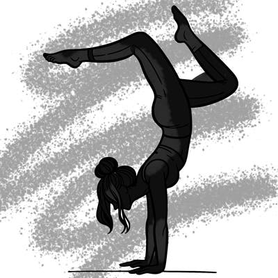 a woman doing a handstand