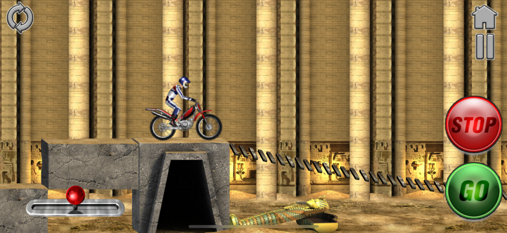A motocross bike rider navigating an Egyptian pyramid themed level in Bike Mania 2.